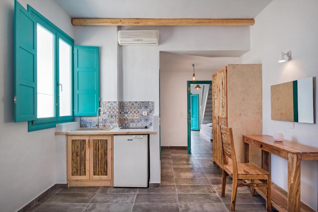 Kuchyň nebo kuchyňský kout v ubytování Nissia Beach Apartments & Suites