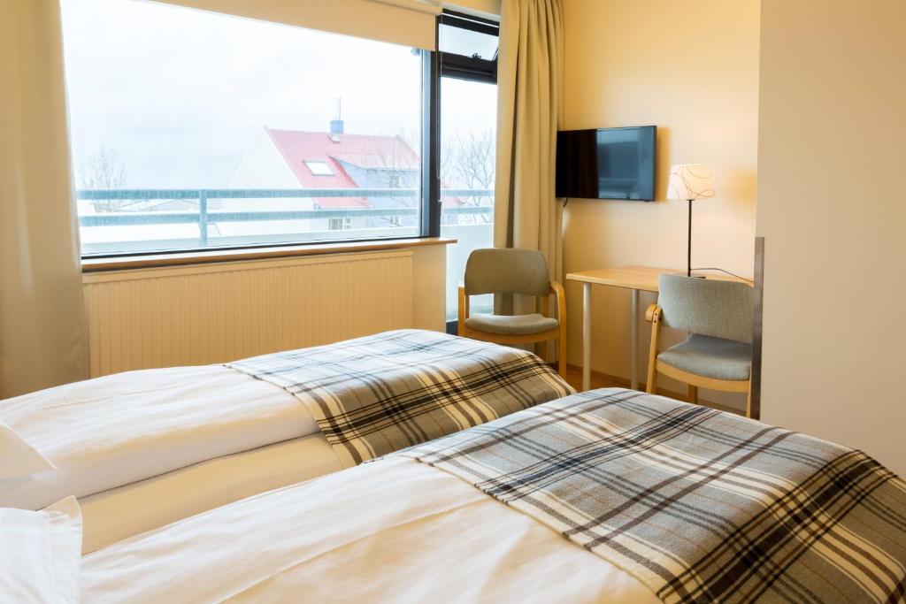 Postel nebo postele na pokoji v ubytování Guesthouse Sunna