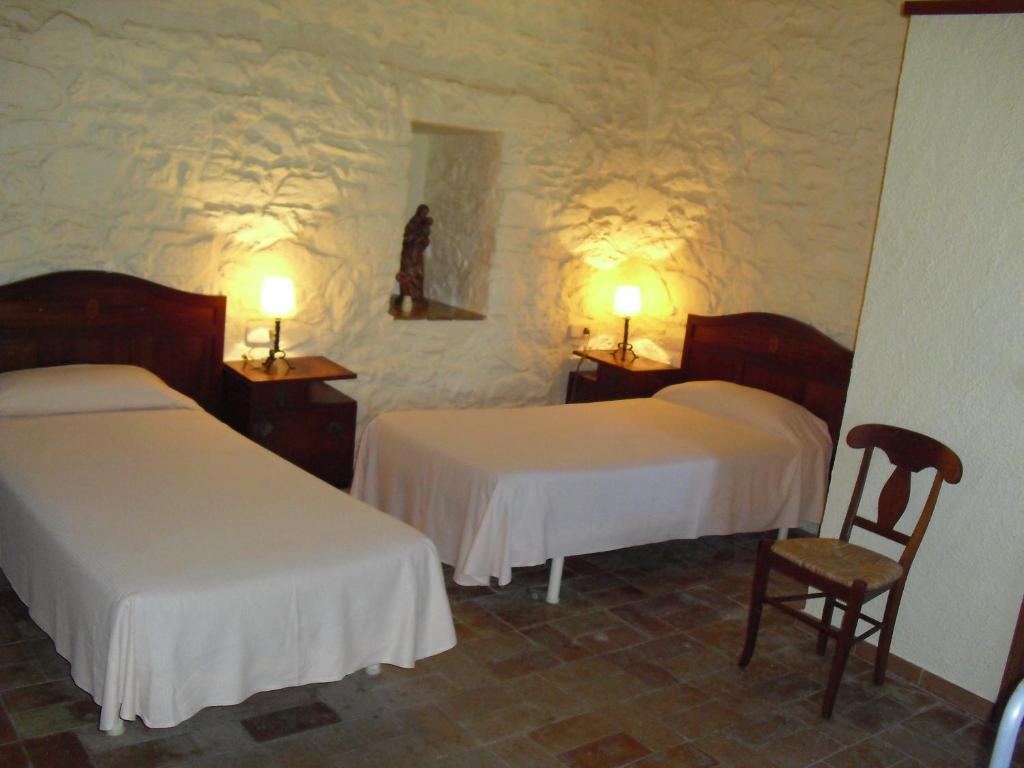 Postel nebo postele na pokoji v ubytování Mas la Torre