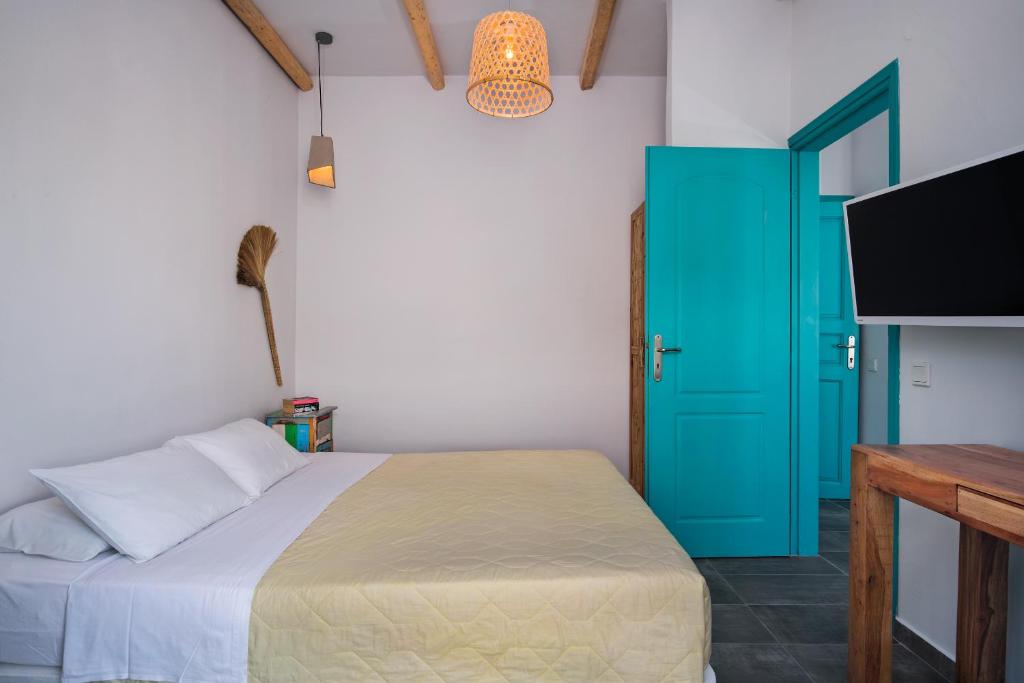 Postel nebo postele na pokoji v ubytování Nissia Beach Apartments & Suites