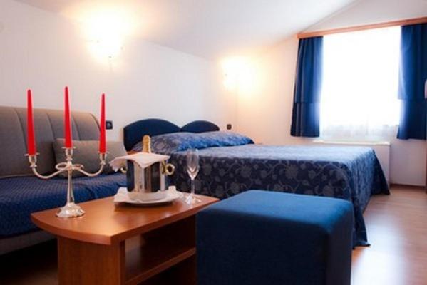 Postel nebo postele na pokoji v ubytování Hotel Makin