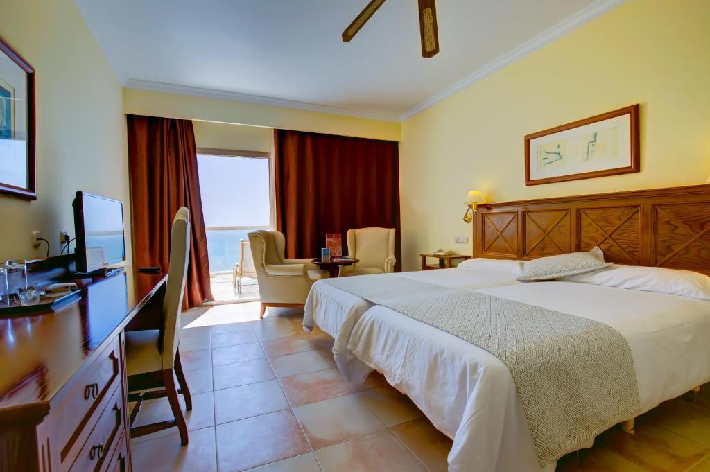 Postel nebo postele na pokoji v ubytování SBH Costa Calma Palace Thalasso & Spa
