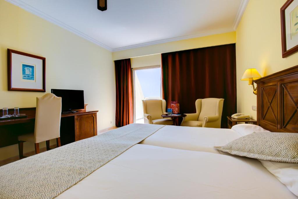 Postel nebo postele na pokoji v ubytování SBH Costa Calma Palace Thalasso & Spa
