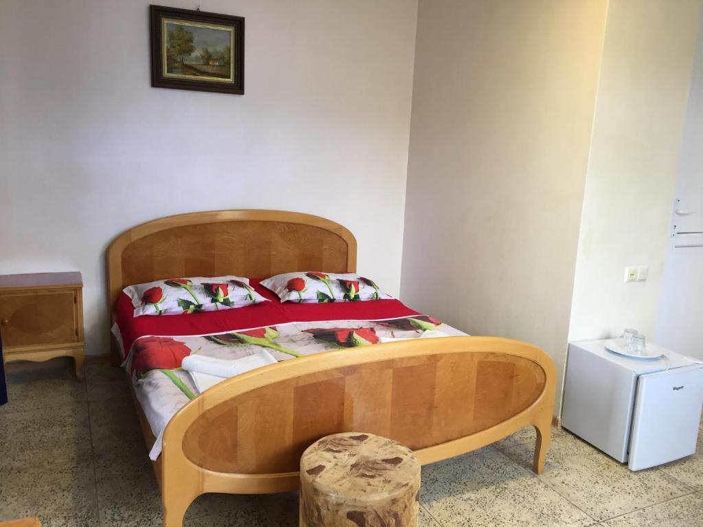 Postel nebo postele na pokoji v ubytování Hotel George