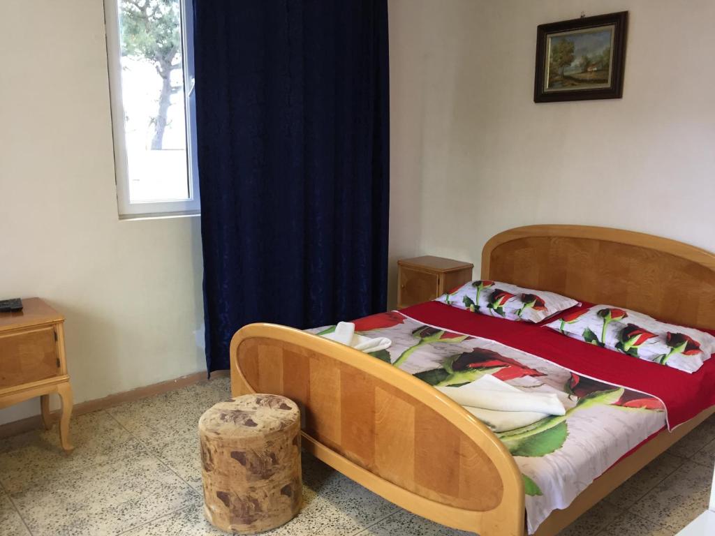 Postel nebo postele na pokoji v ubytování Hotel George
