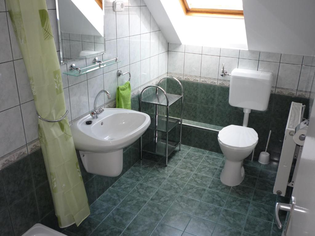 Koupelna v ubytování Apartmanház King