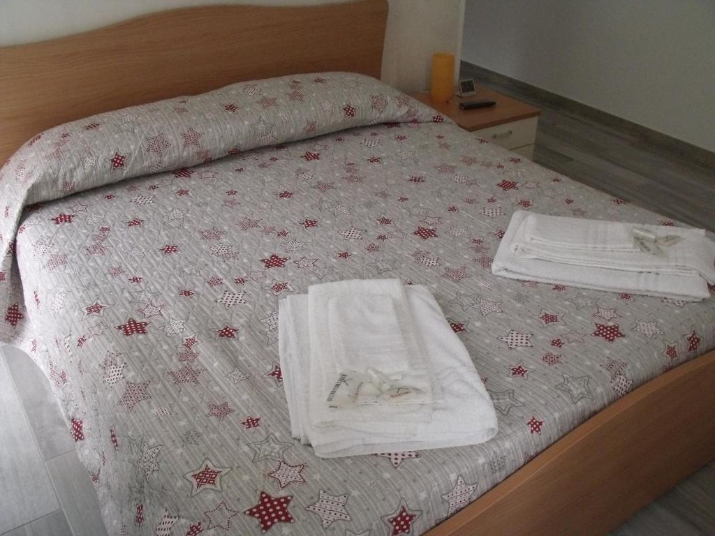 Posteľ alebo postele v izbe v ubytovaní B&B I Like Matera