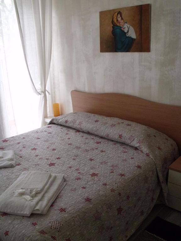 Postel nebo postele na pokoji v ubytování B&B I Like Matera