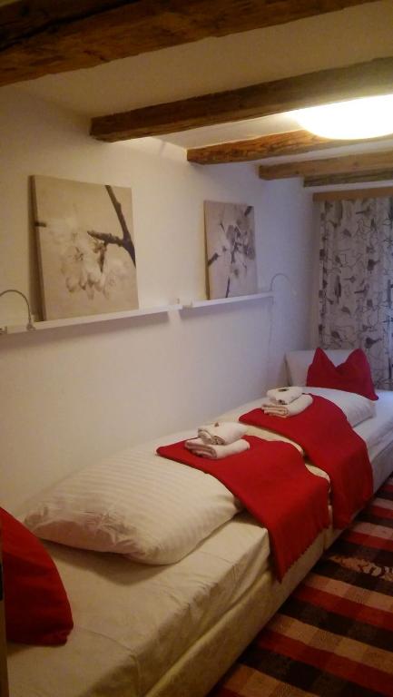 Postel nebo postele na pokoji v ubytování Cityhotel Junger Fuchs