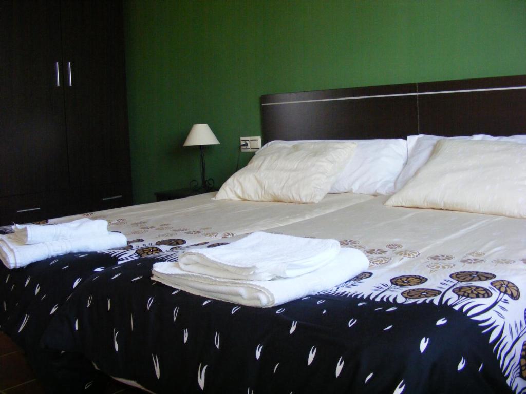 Cama o camas de una habitación en Alojamiento Rural El Chaparral