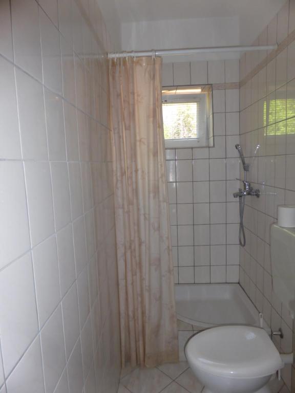 Koupelna v ubytování Apartments Adria