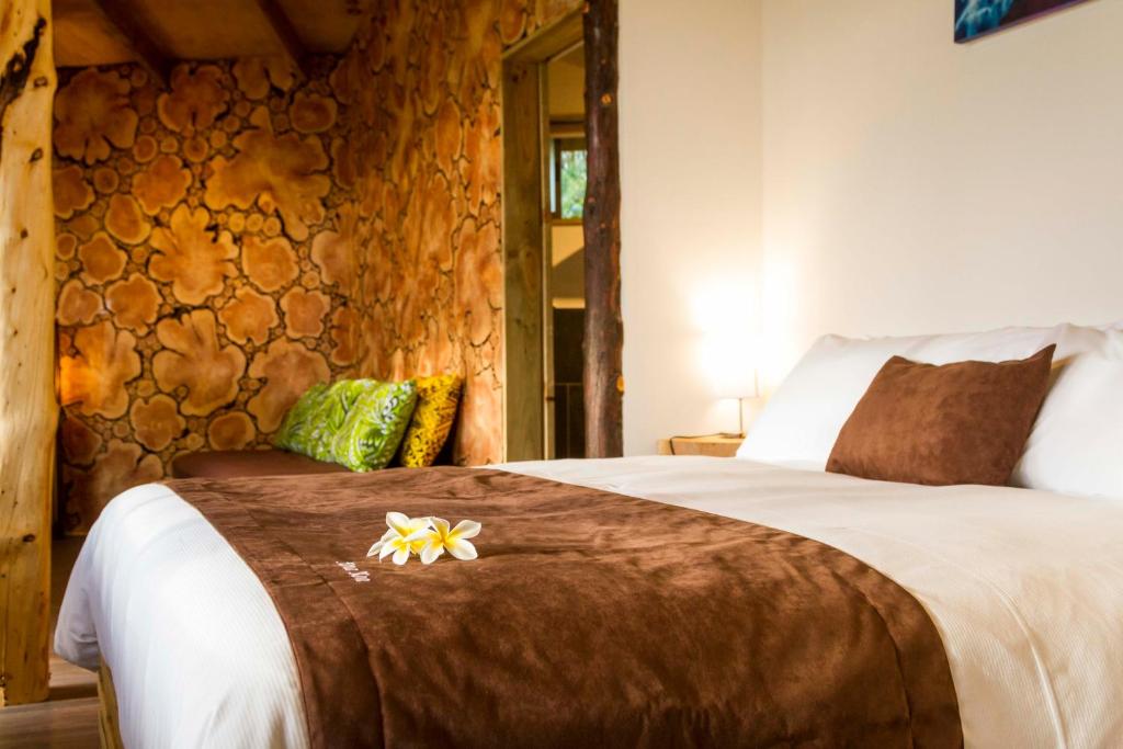 Voodi või voodid majutusasutuse Kona Koa Lodge toas