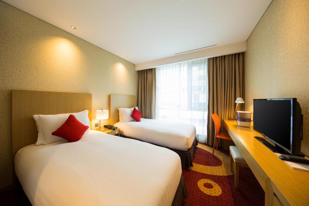 TV a/nebo společenská místnost v ubytování Solaria Nishitetsu Hotel Busan