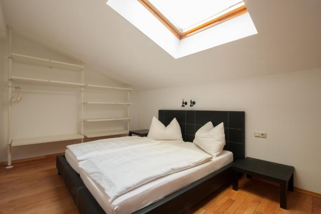 A bed or beds in a room at Appartements Christophorus