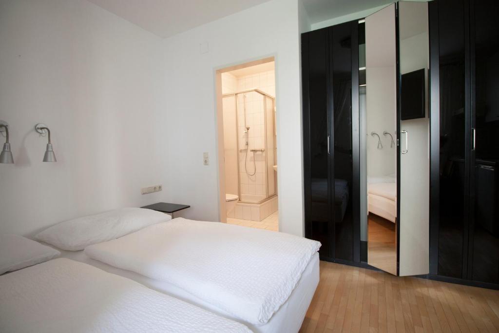 A bed or beds in a room at Appartements Christophorus