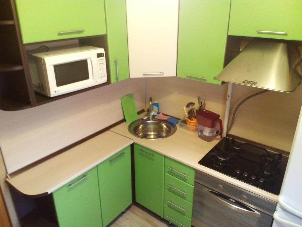 Кухня или мини-кухня в Апартамент Нефтяник 