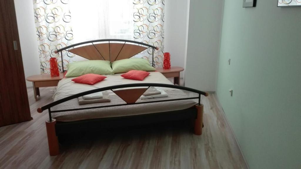 Posteľ alebo postele v izbe v ubytovaní Apartments Olivia