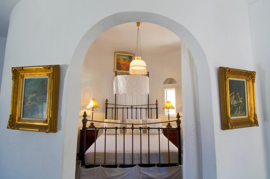 Postel nebo postele na pokoji v ubytování Pegados Apartments