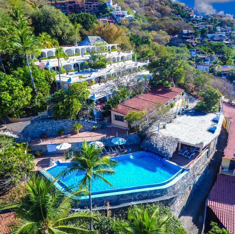an aerial view of a resort with a swimming pool at Hotel Catalina Beach Resort in Zihuatanejo