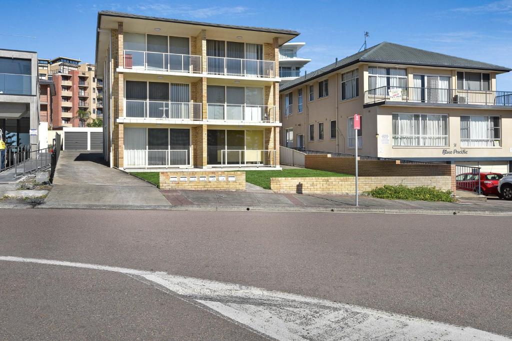 an empty street in front of an apartment building at Waterviews on Marine Pde 3/32 in The Entrance