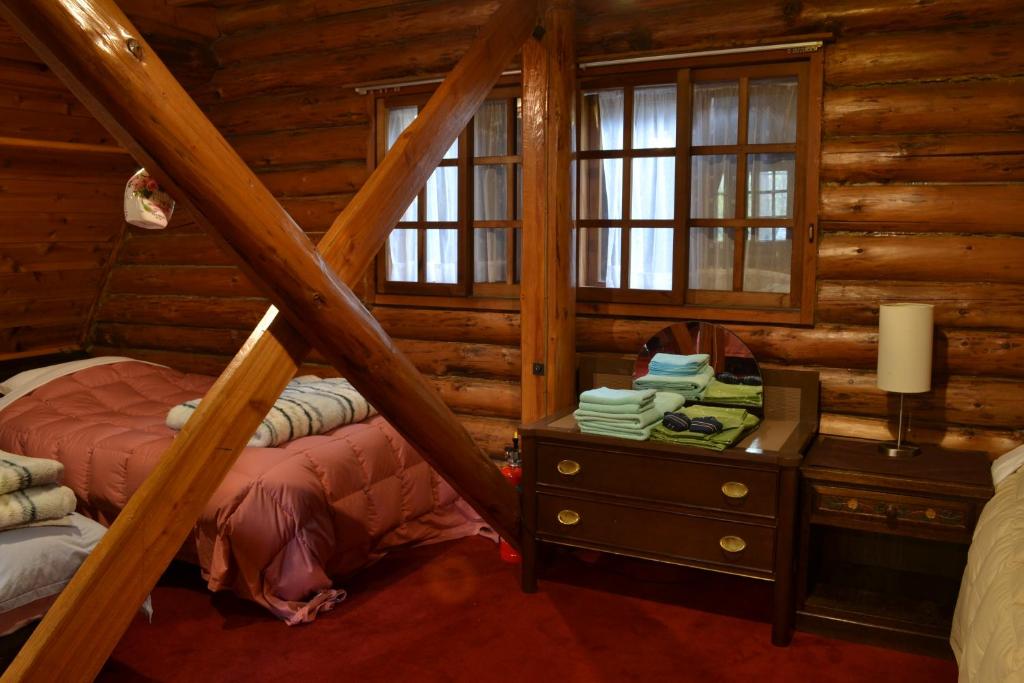 Postel nebo postele na pokoji v ubytování Hakuba Mominoki Hotel