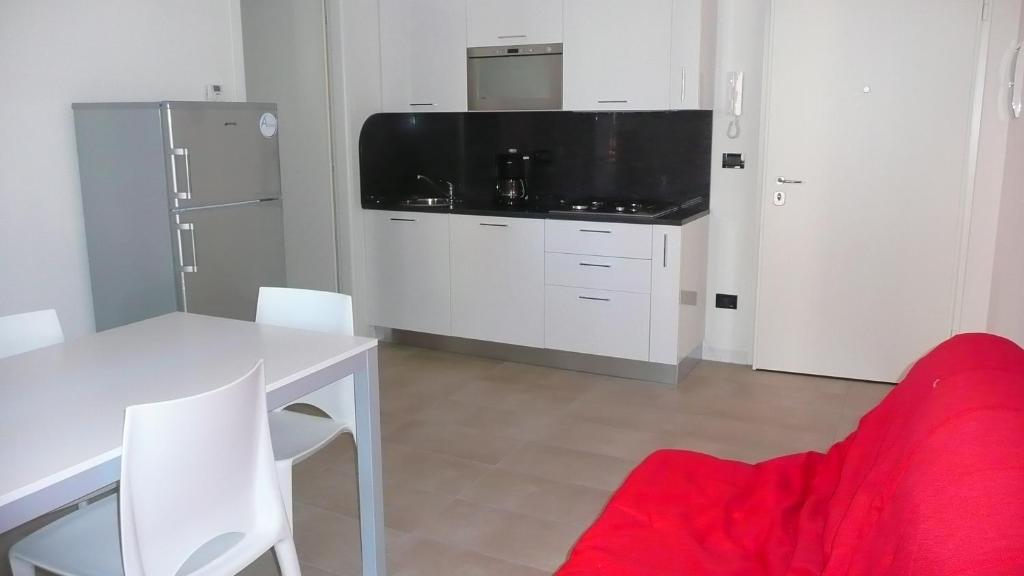 Kuchyň nebo kuchyňský kout v ubytování Villa Marina Apartments - Agenzia Cocal