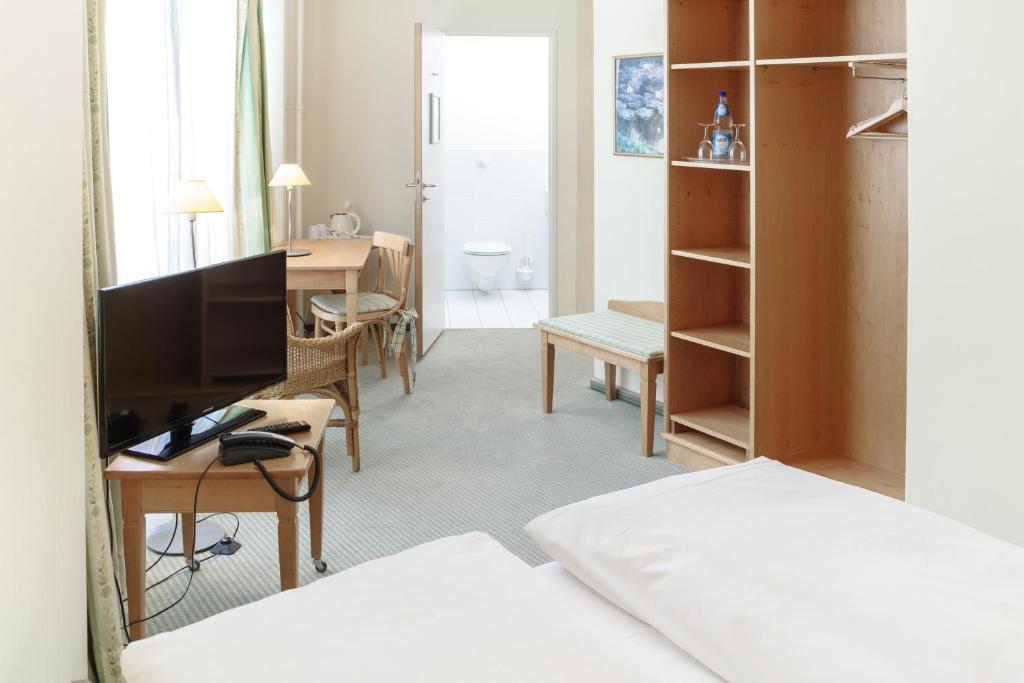 Postel nebo postele na pokoji v ubytování Hotel Leipzig City Nord by Campanile