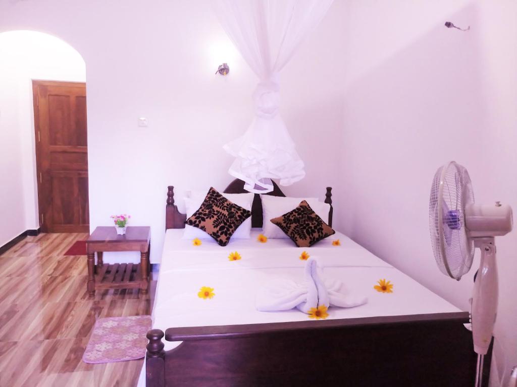 Postel nebo postele na pokoji v ubytování Sunny Side Villa