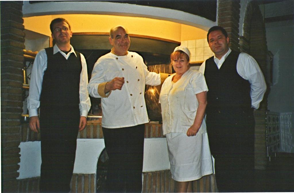 Členové personálu v ubytování Hotel Le Mura