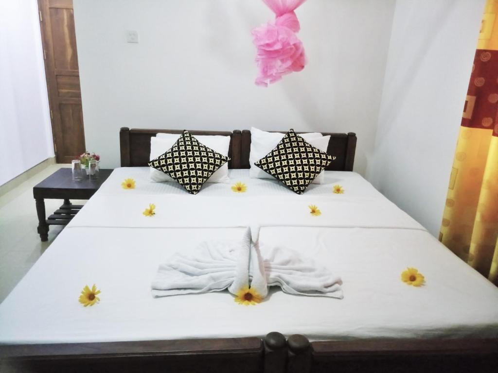Postel nebo postele na pokoji v ubytování Sunny Side Villa