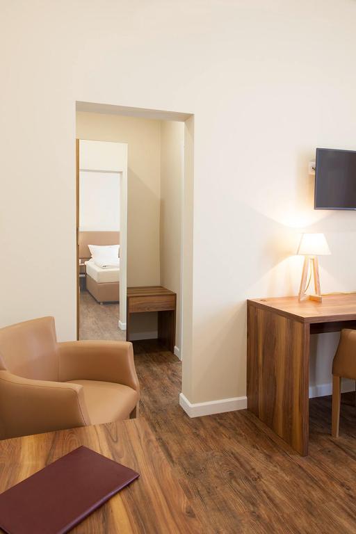 TV a/nebo společenská místnost v ubytování Hotel Engelbert