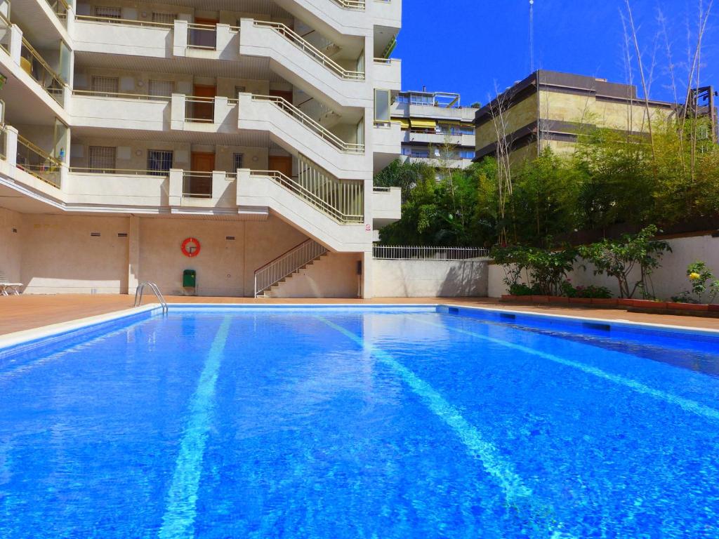 a large swimming pool in front of a building at Rentalmar Decathlon in Salou