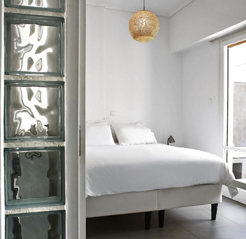 Posteľ alebo postele v izbe v ubytovaní Acropolis Charming Apartment with Large Balcony - DM17