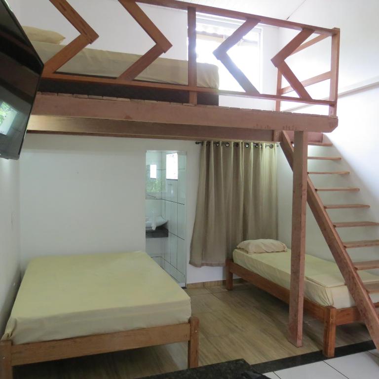 Postel nebo postele na pokoji v ubytování Recanto da Ilha