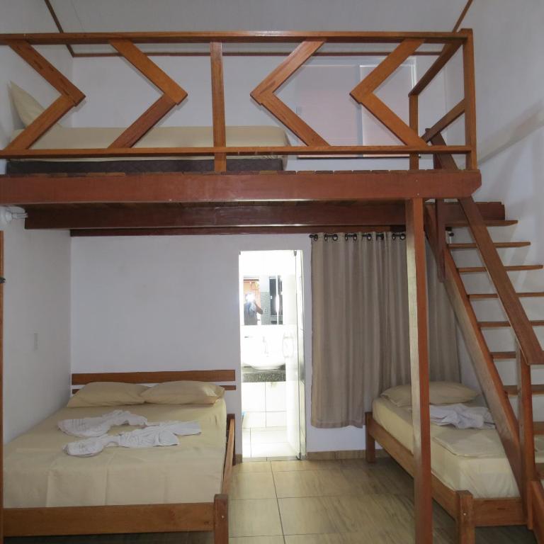 Postel nebo postele na pokoji v ubytování Recanto da Ilha