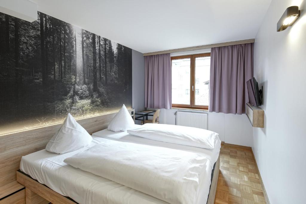Katil atau katil-katil dalam bilik di Hotel Schwarzwälder Hof