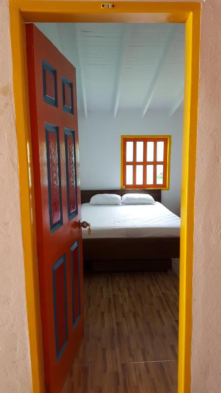 
Cama o camas de una habitación en Hosteria El Paraiso
