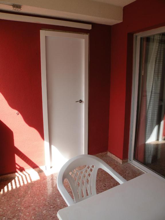 Postel nebo postele na pokoji v ubytování Gijon - Fincas Arena