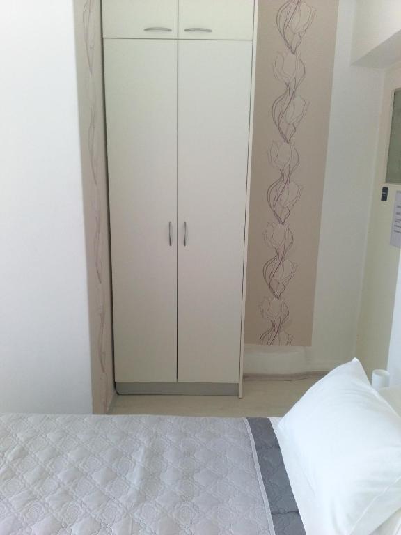 Postel nebo postele na pokoji v ubytování Rooms Katica