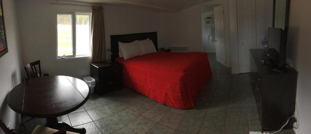 Postel nebo postele na pokoji v ubytování Motel Sainte-Flavie