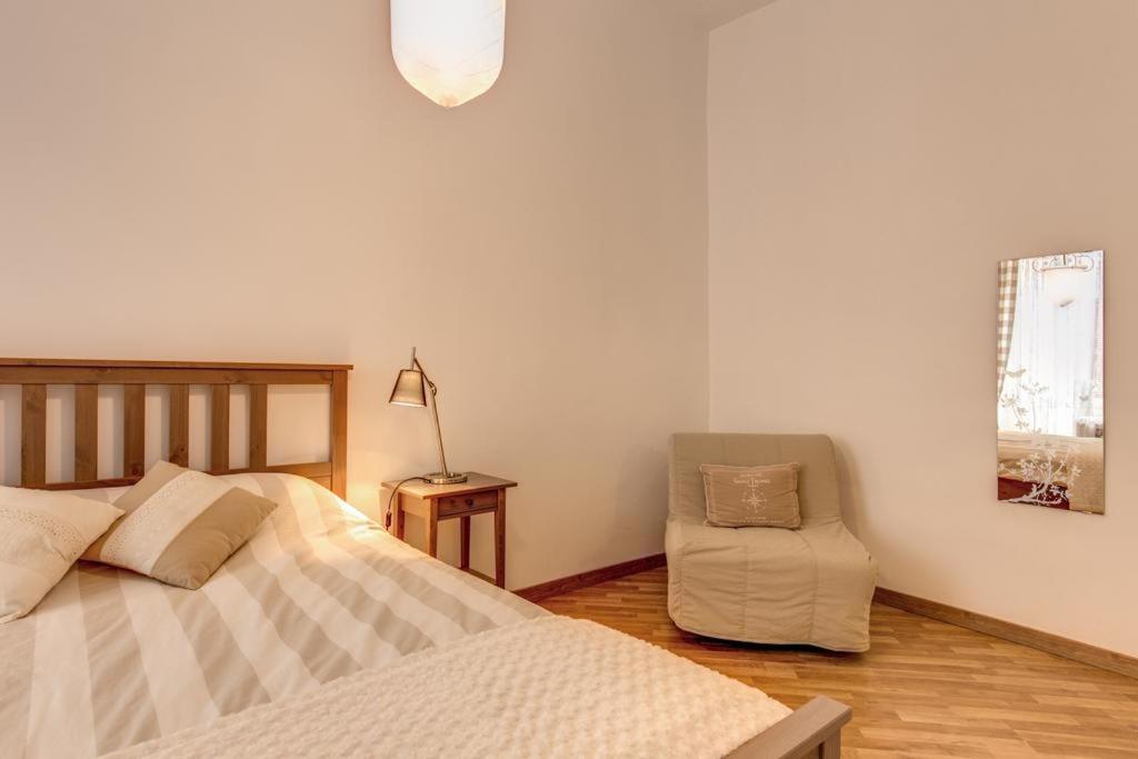 Postel nebo postele na pokoji v ubytování Navona Flat di Elena & Paola