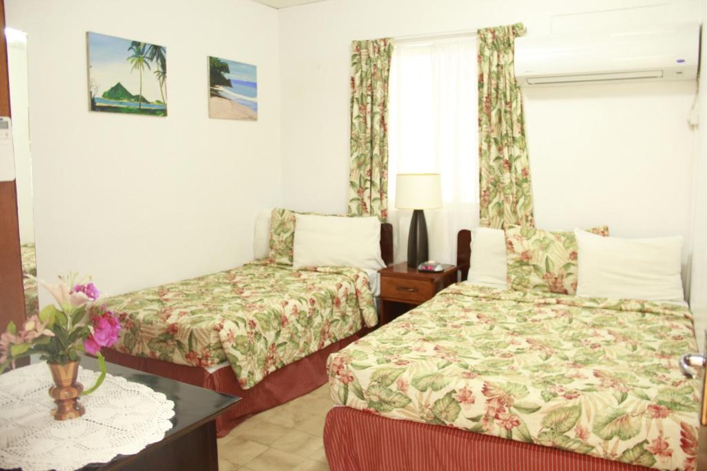 Postel nebo postele na pokoji v ubytování Gem Holiday Beach Resort