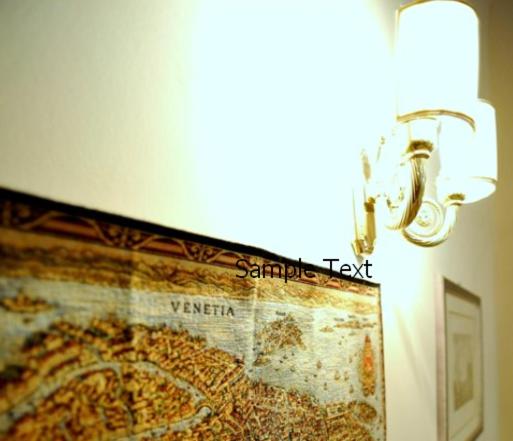 a light on a wall with a map on it at Villa Crispi in Mestre
