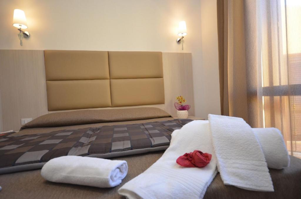Postel nebo postele na pokoji v ubytování B&B Timpe Bianche