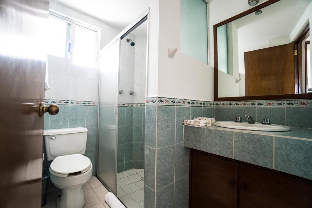 Koupelna v ubytování Hotel Suites Regina