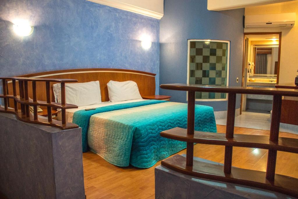 Postel nebo postele na pokoji v ubytování Autohotel Ilussion