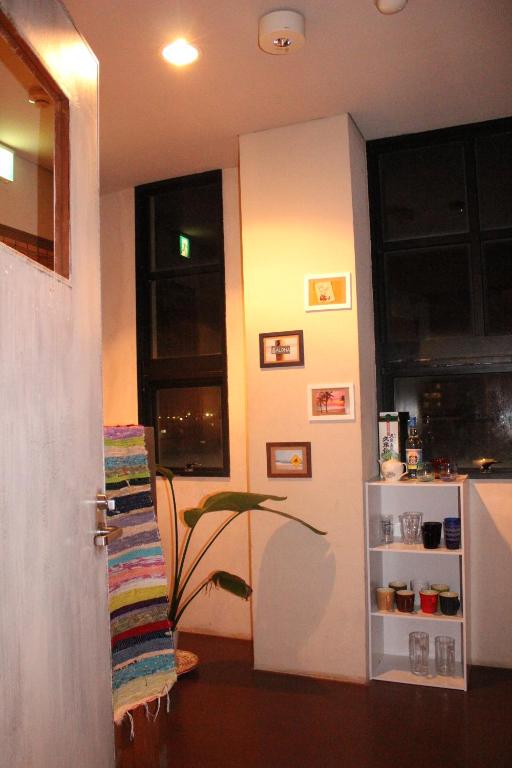 Kuchyň nebo kuchyňský kout v ubytování guest house Holoholo Ishigakijima