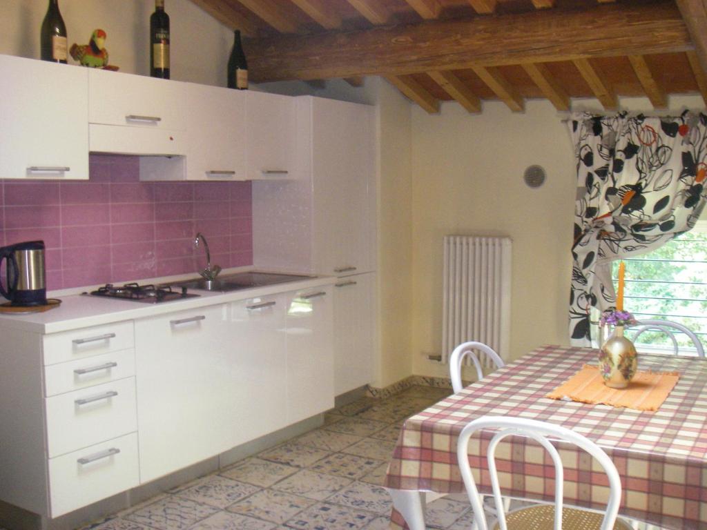 Kuchyň nebo kuchyňský kout v ubytování Residenza Eden