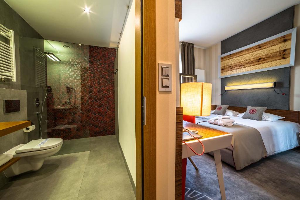 Posteľ alebo postele v izbe v ubytovaní Hotel Kopieniec Fizjo- Med & SPA