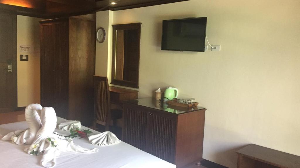 Postel nebo postele na pokoji v ubytování JJ Residence